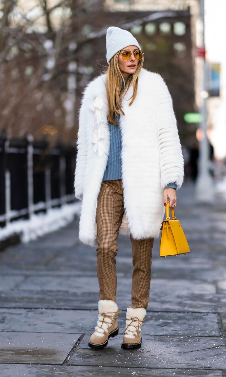 Olivia Palermo in White Fur Coat Looks Stylish While Stepping Out in NYC