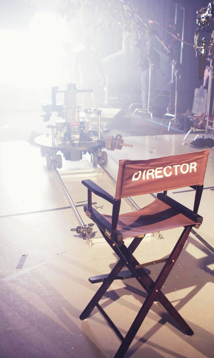 A director's chair on a film set.