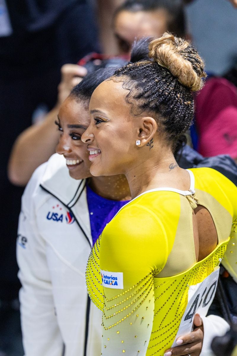 Gold medal winner Simone Biles of the United States and bronze medal winner Rebeca Andrade of Brazil embrace after the Women's Balance Beam Final at the Artistic Gymnastics World Championships-Antwerp 2023 at the Antwerp Sportpaleis on October 8th, 2023 in Antwerp, Belgium. 
