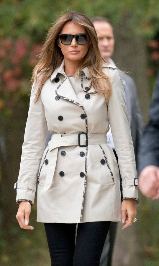 Melania wore a pair of dark J Brand jeans as she joined President Trump on a tour of the U.S. Secret Service James J. Rowley Training Center on October 13 in Beltsville, Maryland. The 47-year-old was ready for fall season in one of British brand Burberry's signature trench coats with a woven print trim.
Photo: Getty Images