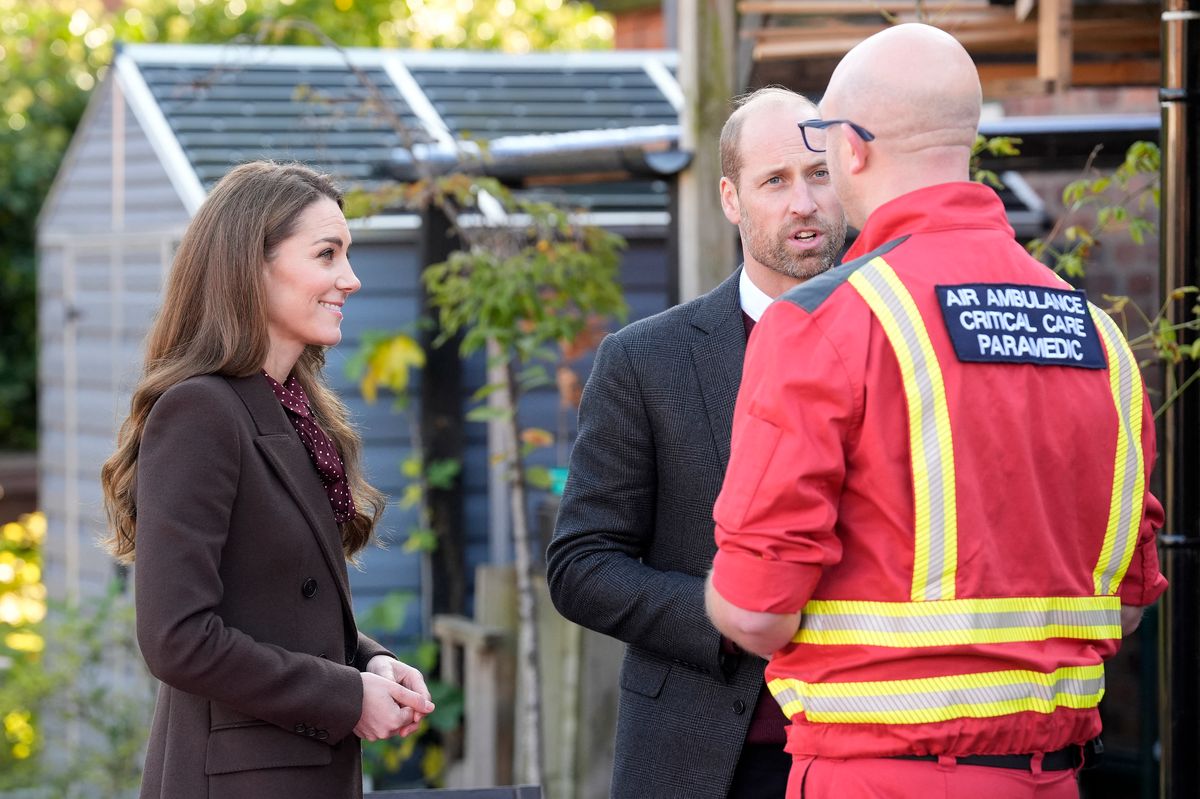 Britain's Prince William, Prince of Wales and Britain's Catherine, Princess of Wales speak to members of the emergency services during a visit to Southport Community Centre in Southport, north west England on October 10, 2024, where they met rescue workers and the families of those caught up in the Southport knife attack earlier this year. Bebe King, six, Elsie Dot Stancombe, seven, and Alice da Silva Aguiar, nine, all died in an attack at a Taylor Swift-themed dance class in the town on July 29, which also left ten people injured, eight of them children. (Photo by Danny Lawson / POOL / AFP) (Photo by DANNY LAWSON/POOL/AFP via Getty Images)