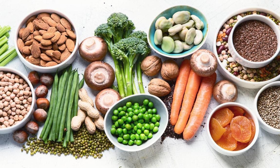 Legumes, dried fruit, carrots, nuts, and broccoli