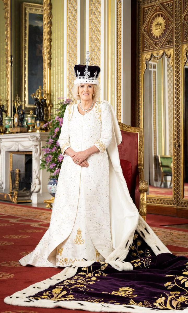 Queen Camilla posed for her official portrait in the Green Drawing Room at Buckingham Palace. Like her husband, Her Majesty was photographed wearing the Robe of Estate, in addition to Queen Mary's Crown.