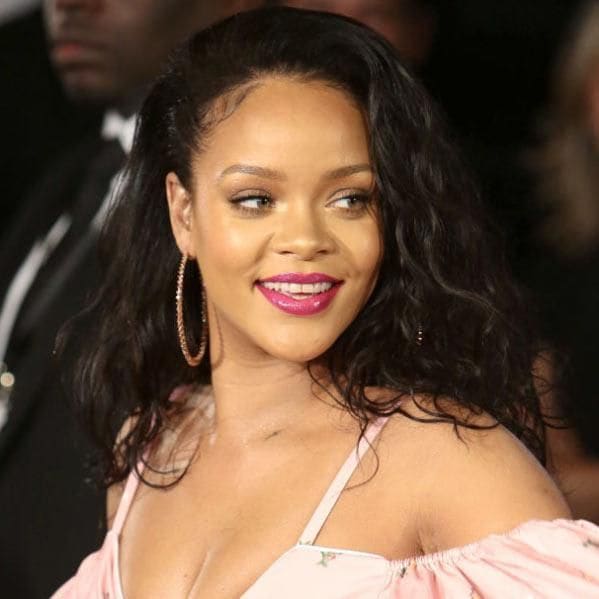 Rihanna with a pink top