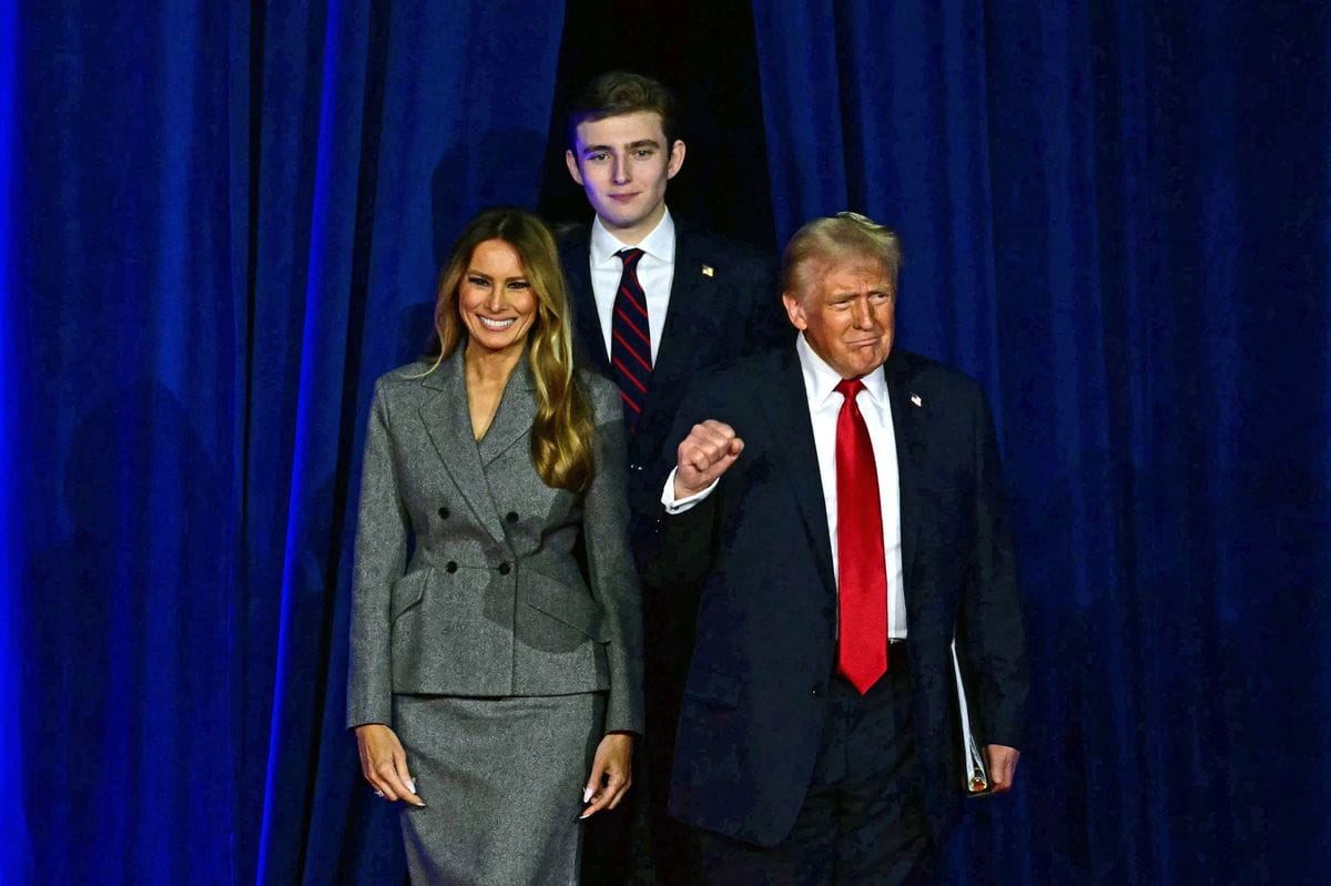 President and Republican presidential candidate Donald Trump (R) arrives for  an election night event alongside former US First Lady Melania Trump and his son Barron Trump at the West Palm Beach Convention Center in West Palm Beach, Florida, on November 6, 2024. (Photo by Jim WATSON / AFP) (Photo by JIM WATSON/AFP via Getty Images)