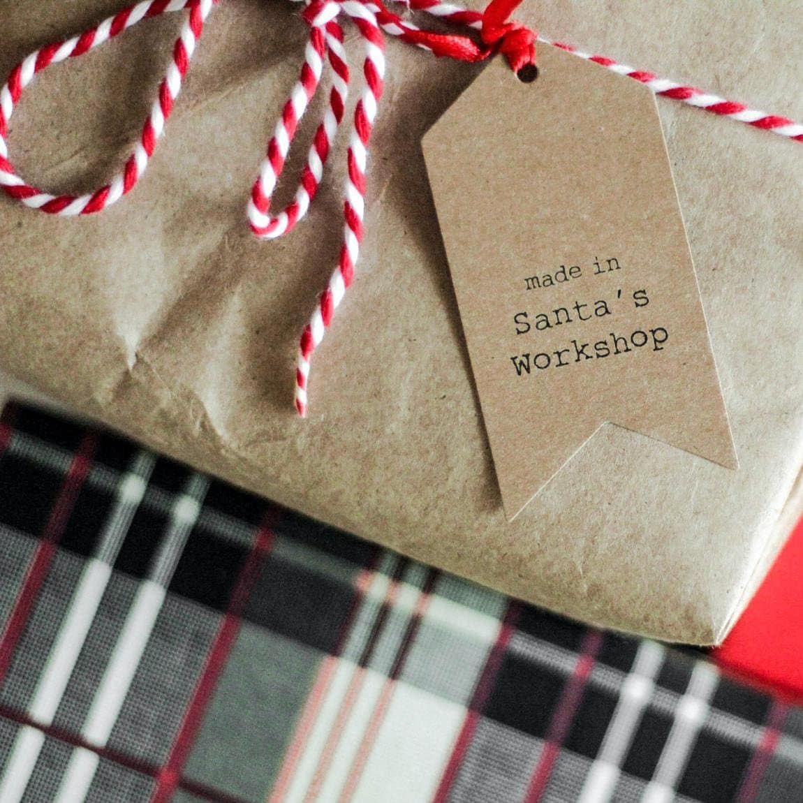 Box wrapped with festive wrapping paper.