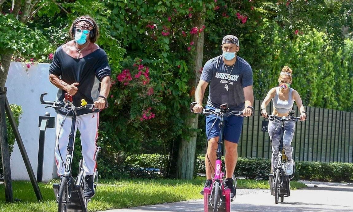 Jennifer Lopez & Alex Rodriguez work out on ElliptiGo bikes with their personal trainer.