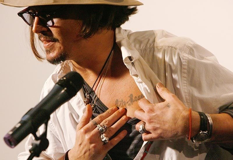 Johnny Depp has a tattoo of Lily Rose's name on his chest