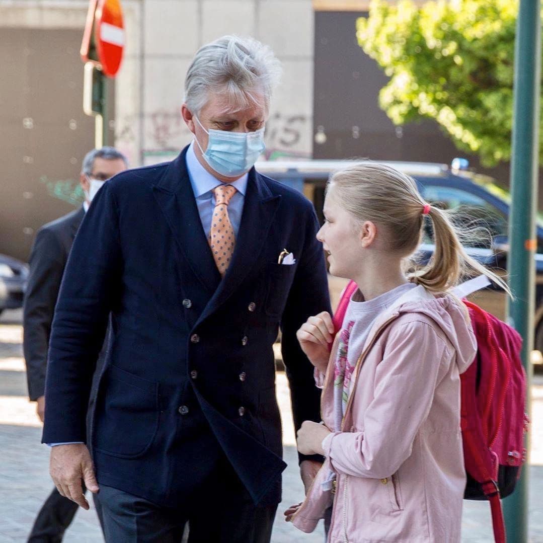 The King wore a mask as he dropped his daughter off at school on May 15