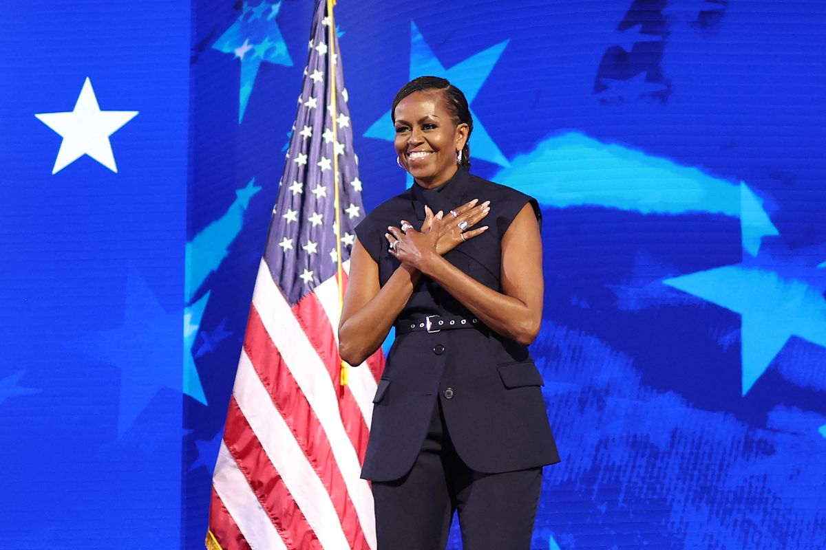 Former US First Lady Michelle Obama arrives to speak on the second day of the Democratic National Convention (DNC) at the United Center in Chicago, Illinois, on August 20, 2024. Vice President Kamala Harris will formally accept the party's nomination for president at the DNC which runs from August 19-22 in Chicago. (Photo by CHARLY TRIBALLEAU / AFP) (Photo by CHARLY TRIBALLEAU/AFP via Getty Images)