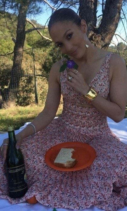 Before leaving for Miami, the "Booty" singer shared a beautiful pic of her in a sundress on what appeared to be a family picnic, along with the caption: "Lets have a Picnic!!! #momlife #mamaandsontime #LOVE."
Photo: Instagram/@Jlo