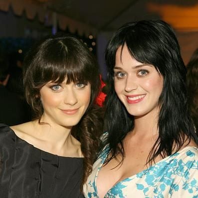 Katy Perry and Zooey Deschanel pose together looking like two bangs-wearing twins