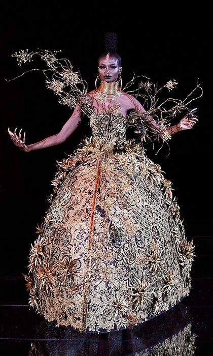 <b>GUO PEI</B>
Chinese couturier Guo Pei, who famously created Rihanna's bright yellow, fur-trimmed Met Ball gown in 2015, brought sheer fantasy to the haute couture catwalk with a collection inspired by "life", including this gilded bridal creation bedecked with 3D floral details.
Photo: PATRICK KOVARIK/AFP/Getty Images