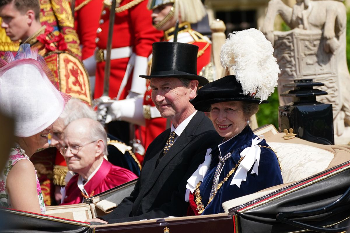 WINDSOR, ENGLAND - JUNE 19: (L-R) Sophie, Duchess of Edinburgh, Vice Admiral Sir Tim Laurence and the Princess Royal depart after the Order Of The Garter Service at Windsor Castle on June 19, 2023 in Windsor, England. The Order of the Garter is the oldest and most senior Order of Chivalry in Britain. Knights of the Garter are chosen personally by the Sovereign to honour those who have held public office, contributed in a particular way to national life or who have served the Sovereign personally. During the service, the Baroness Ashton of Upholland GCMG will be installed as a Lady Companion of the Most Noble Order of the Garter, and the Lord Patten of Barnes CH will be installed as a Knight Companion of the Most Noble Order of the Garter. (Photo by Yui Mok - WPA Pool/Getty Images)