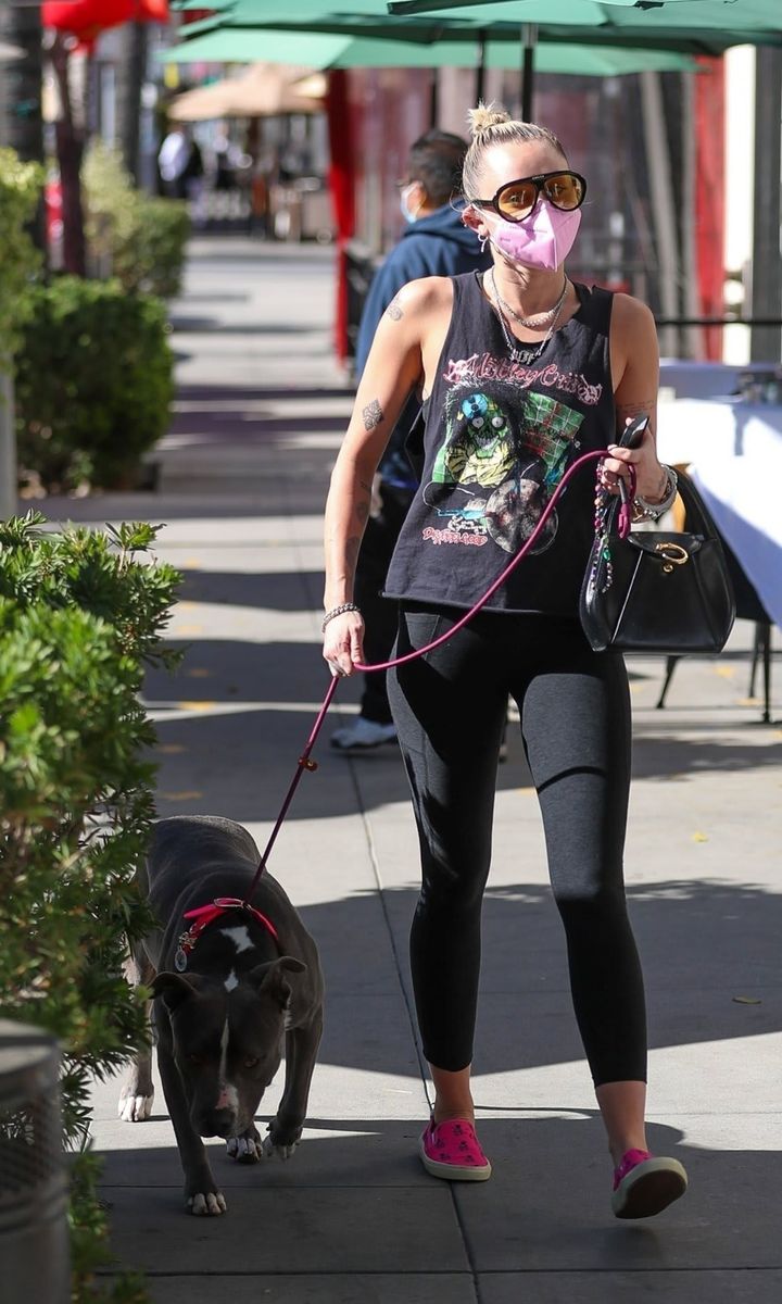 Miley Cyrus and dog