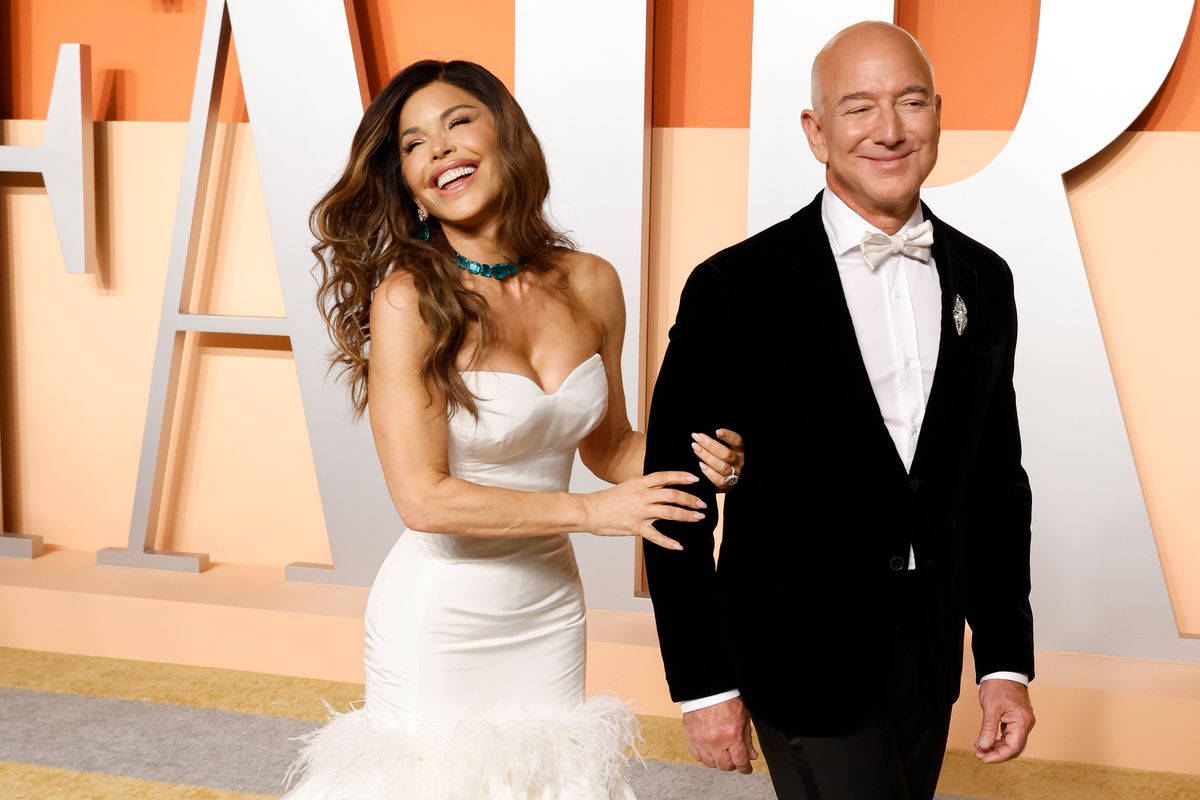 Lauren Sanchez and Jeff Bezos attend the 2025 Vanity Fair Oscar Party 