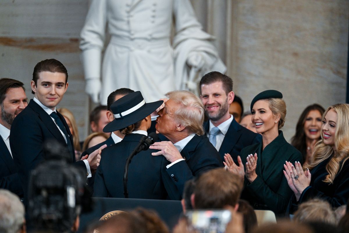 President Donald Trump celebrates with family after being sworn in at his inauguration in the U.S. Capitol Rotunda 