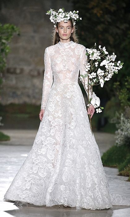 Given its sheer nature, Reem Acra's embroidered lace look shows that full coverage and long sleeves doesn't necessarily mean demure.
Photo: Getty Images