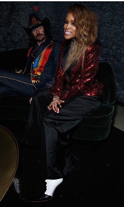 We love the statement jackets! Eve, in red sequins, chatted with Midland's Mark Wystrach wearing a custom denim blazer with a parrot motif at the Universal Music Group's 2018 celebration of the Grammy Awards presented by American Airlines and Citi.
Photo: Brian Ach/Getty Images for Universal Music Group