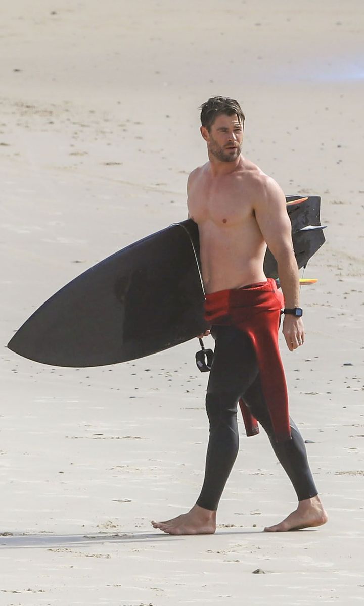 Chris Hemsworth surfing