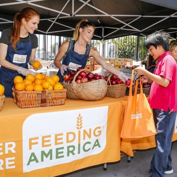 June 23: Ashley Greene and Darby Stanchfield partnered with Feeding America and the Los Angeles regional food bank for the "Put the Heat on Hunger" event at Para Los Ninos Charter Elementary School in L.A.
<br>
Photo: Getty Images