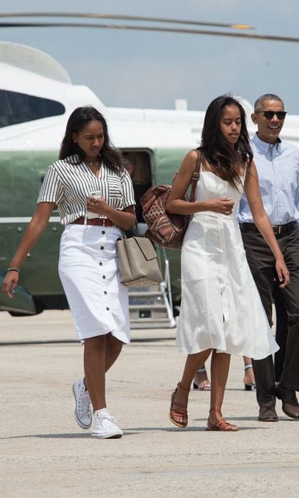 August 2016: The Obama girls were vacation-ready sporting summer ensembles as they prepared to depart for a two-week holiday at Martha's Vineyard.
Photo: NICHOLAS KAMM/AFP/Getty Images