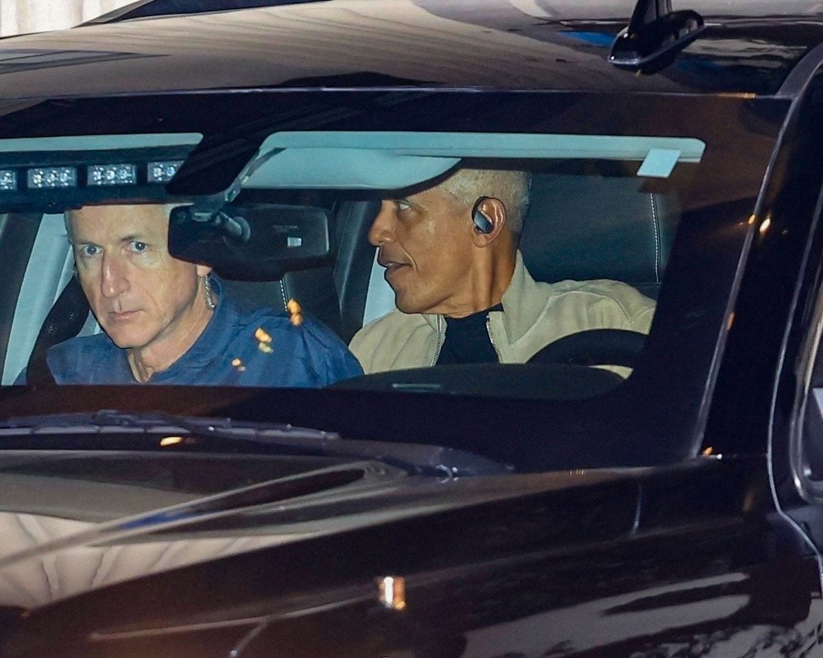 Barack Obama in the car with his driver