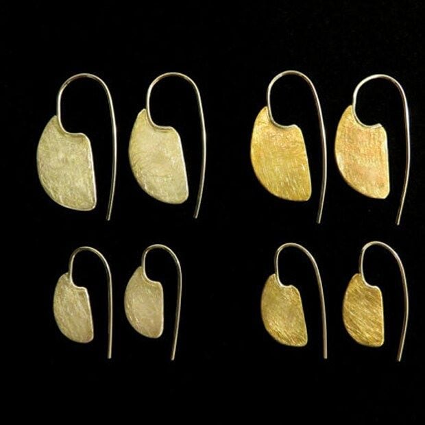 If you're looking to wrap up a little of Kate's class with a much lower price tag, consider these bronze earrings from Canadian designer Shelley Macdonald. The Duchess wore hers during the Cambridges' visit to the Yukon in September, 2016.
<b>Small Bronze Modern Ulu earrings</B>, $49, Etsy.com