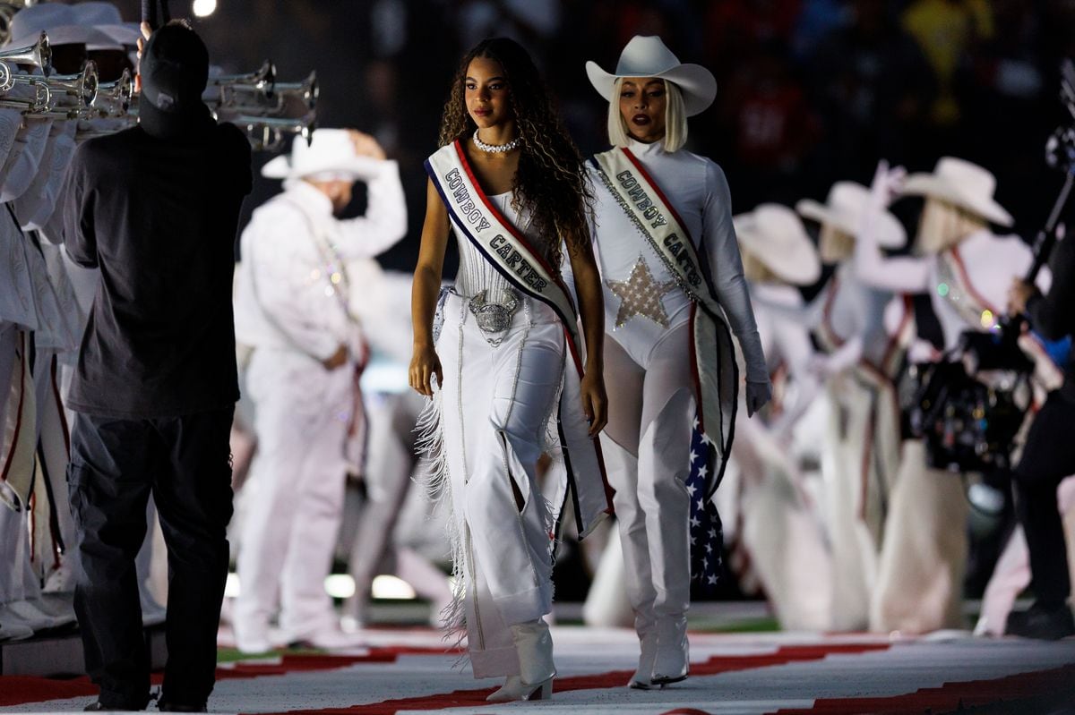  Blue Ivy walks onto the field for the BeyoncÃ© halftime show during an NFL football game between the Baltimore Ravens and the Houston Texans, at NRG Stadium on December 25, 2024 in Houston, Texas. (Photo by Brooke Sutton/Getty Images)