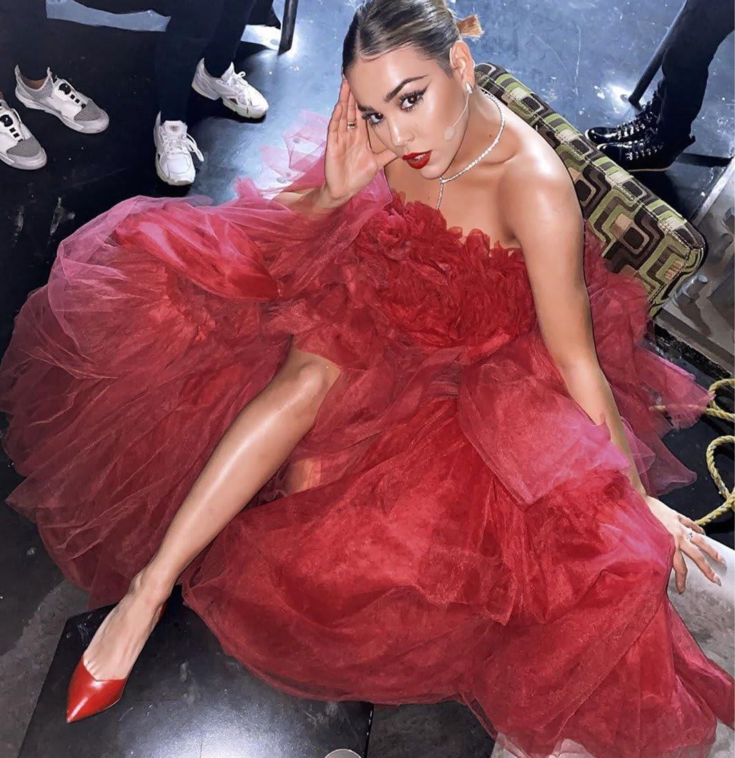 Danna Paola in a red dress made by designer Ivan Avalos