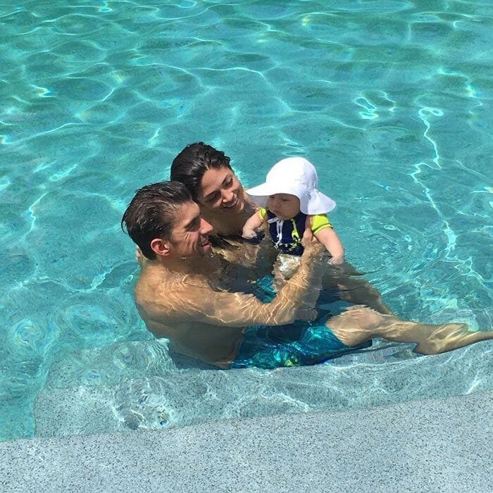 Retirement is off to a great start for Michael! After winning six Olympic medals in Rio, the games' most decorated athlete returned to the states with his son and fiancee for a dip in the pool. The swimmer captioned the sweet family photo, "There's nothing like being back home!! Great way to spend my first day in retirement!! @boomerrphelps @nicole.m.johnson."
</br><br>
Photo: Instagram/@m_phelps00