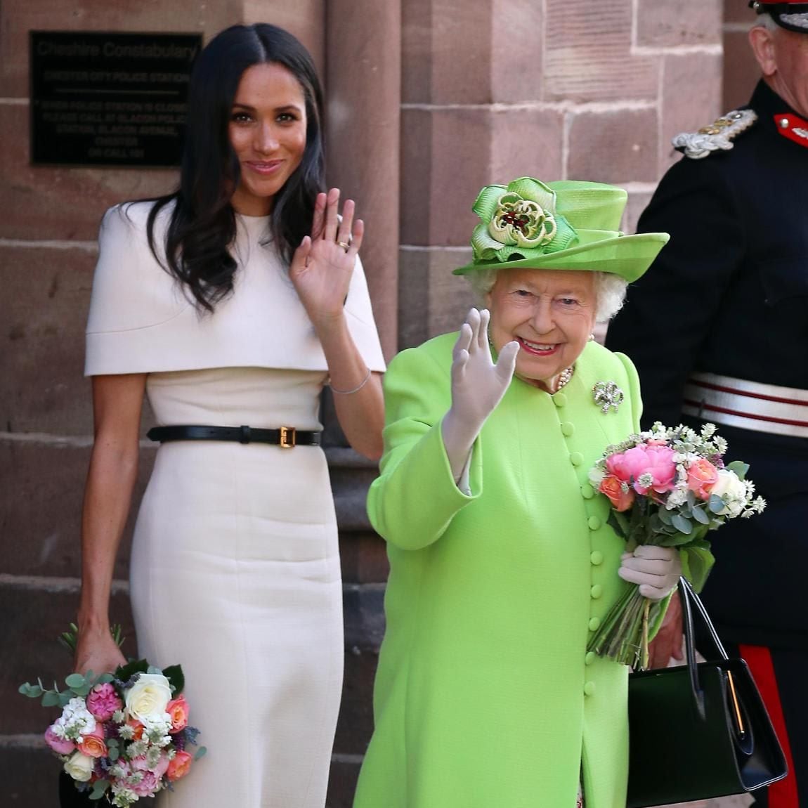 Queen Elizabeth II and Meghan, Duchess of Sussex leaving Chester Town Hall