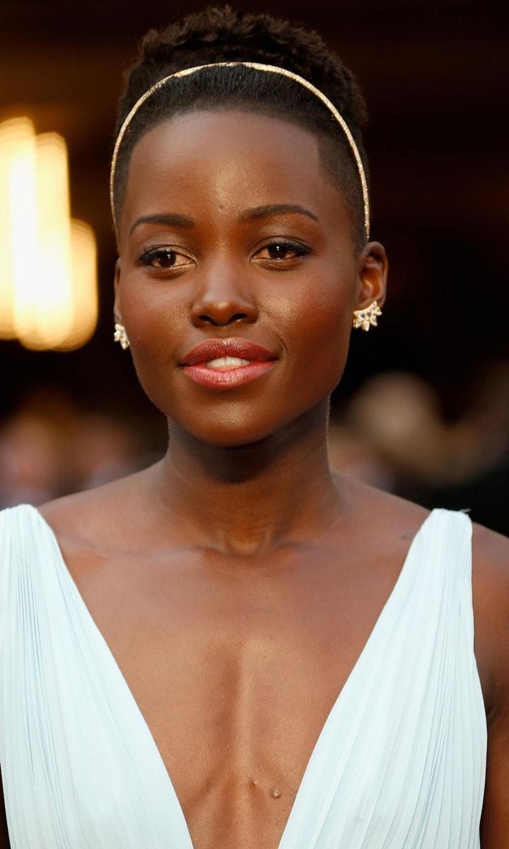 Lupita Nyong'o with Fred Leighton jewelery during the 2014 Oscars