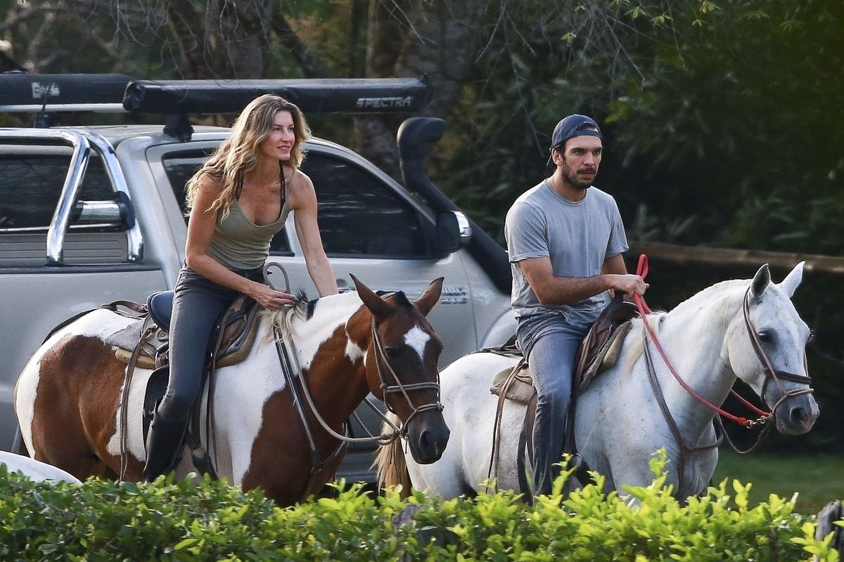 Gisele Bundchen is all smiles as she goes horseback riding with jiu-jitsu instructor Joaquim Valente and her kids in Costa Rica.