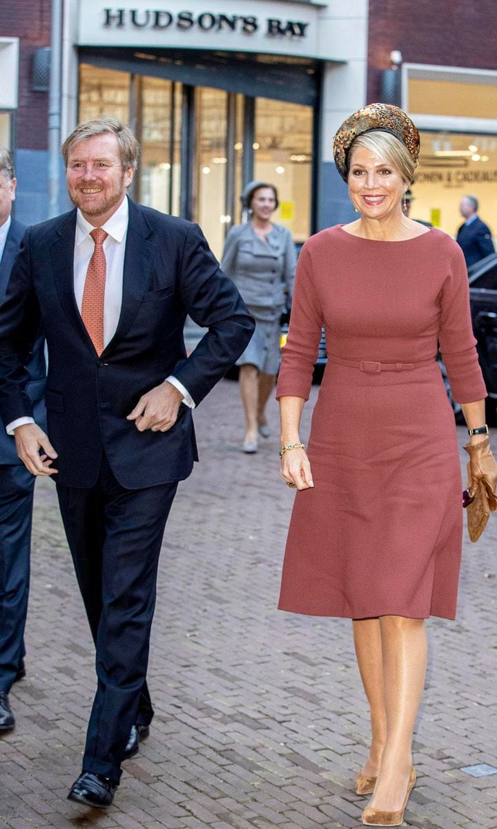 Queen Maxima shows off style credentials in unique feathered hat