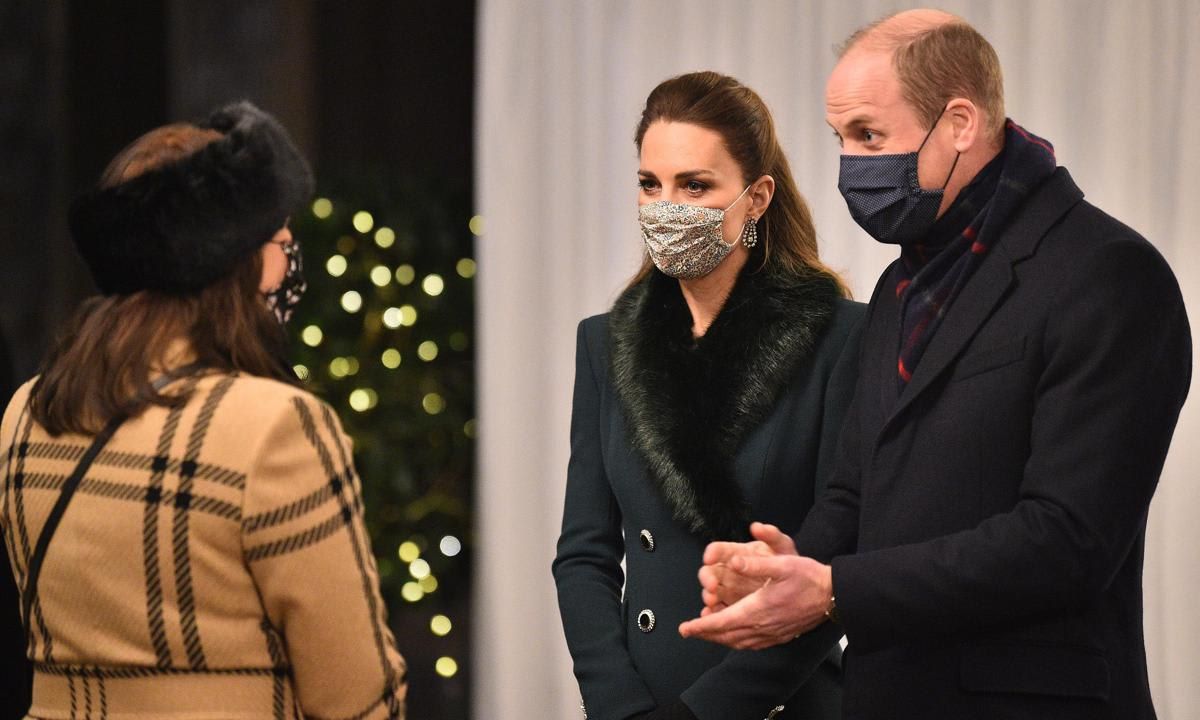 The Duchess looked elegant in a green coat and diamond earrings