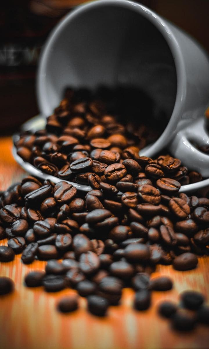 Close up of roasted coffee beans on table