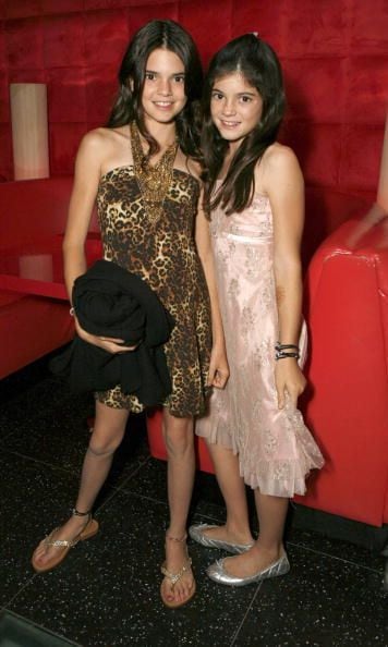 One of the sisters' early public appearances at a screening of <i>Keeping Up with the Kardashians</i> in 2007. Kendall chose to channel her wild side with the cheetah print while Kylie kept it classic with a sweet pink print dress.
<br>
Photo: Getty Images