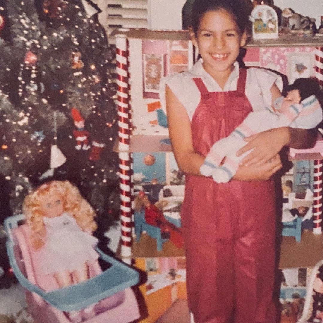 Eva Mendes cute throwback picture with a doll