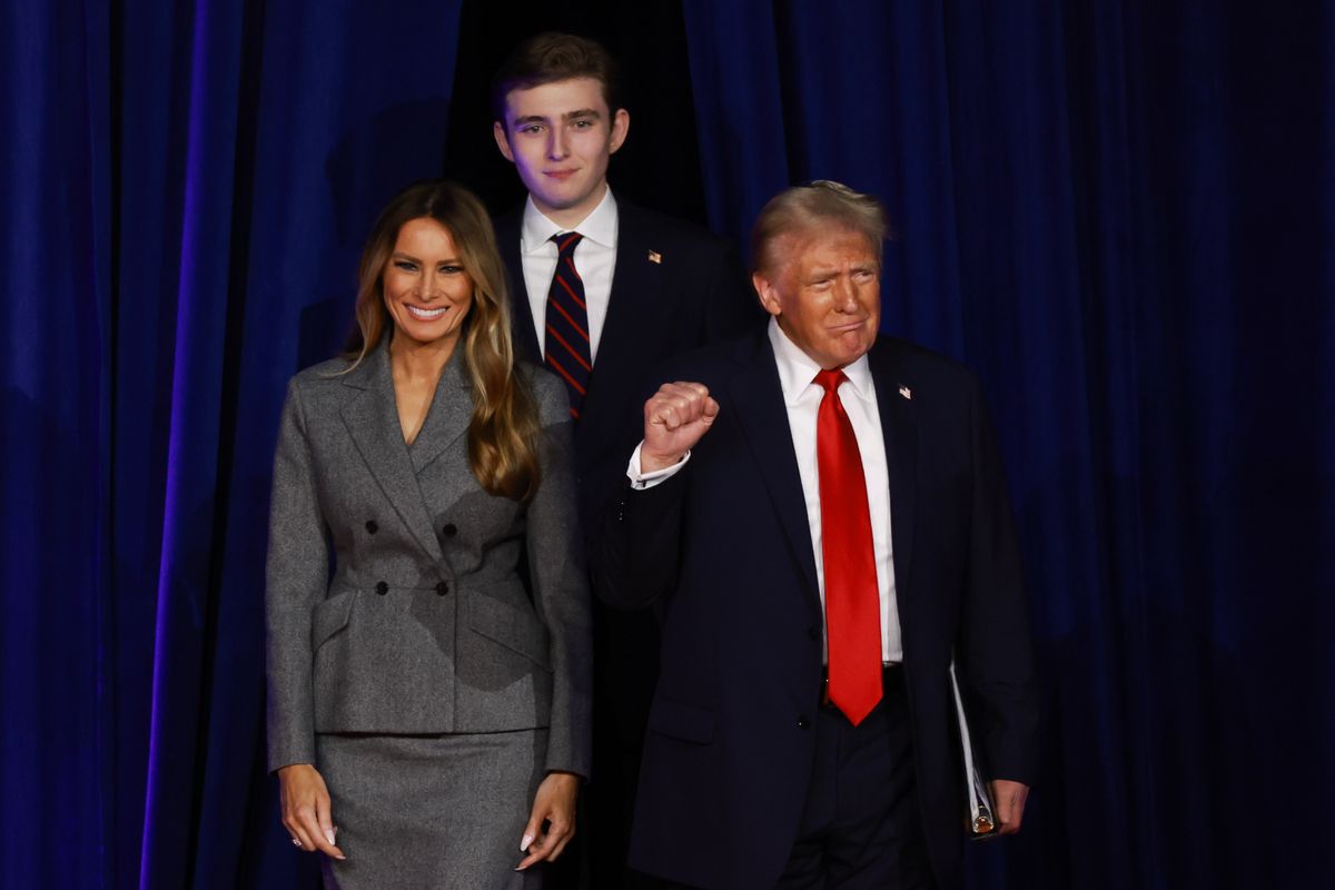 Donald Trump arrives to speak with former first lady Melania Trump and Barron Trump during election night event at the Palm Beach Convention Center 