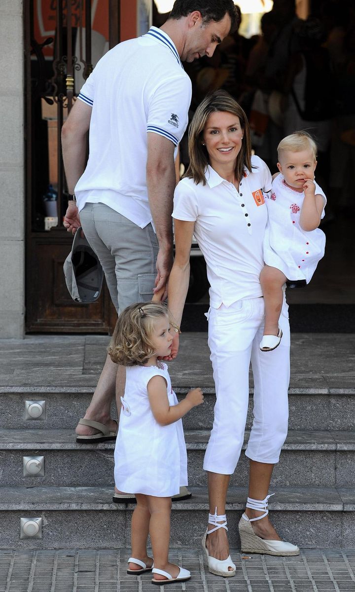 Letizia had her hands full carrying Sofia and watching Leonor while at the 27th Copa del Rey Mapfre Audi Sailing Cup in 2008.