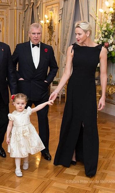 Hosting Prince Andrew as he came to the principality for a visit, Princess Charlene of Monaco wore a black floor length gown with a subtle split. The royal held hands with her daughter Princess Gabriella, who looked just as elegant in her cream-colored brocade dress.
Photo: Palais Princier de Monaco