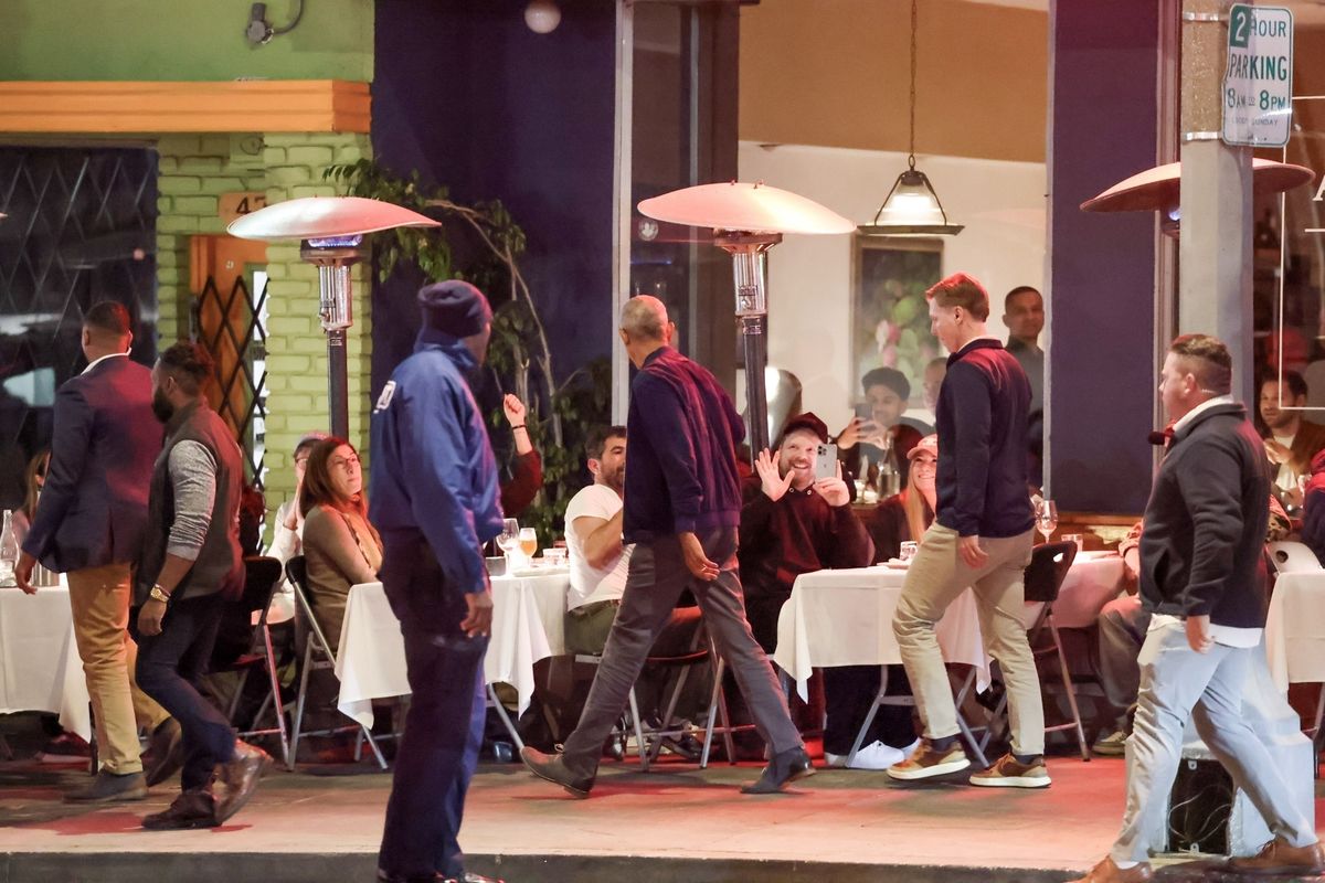 Former President Barack Obama enjoys a family dinner in Los Angeles with daughters Malia and Sasha.