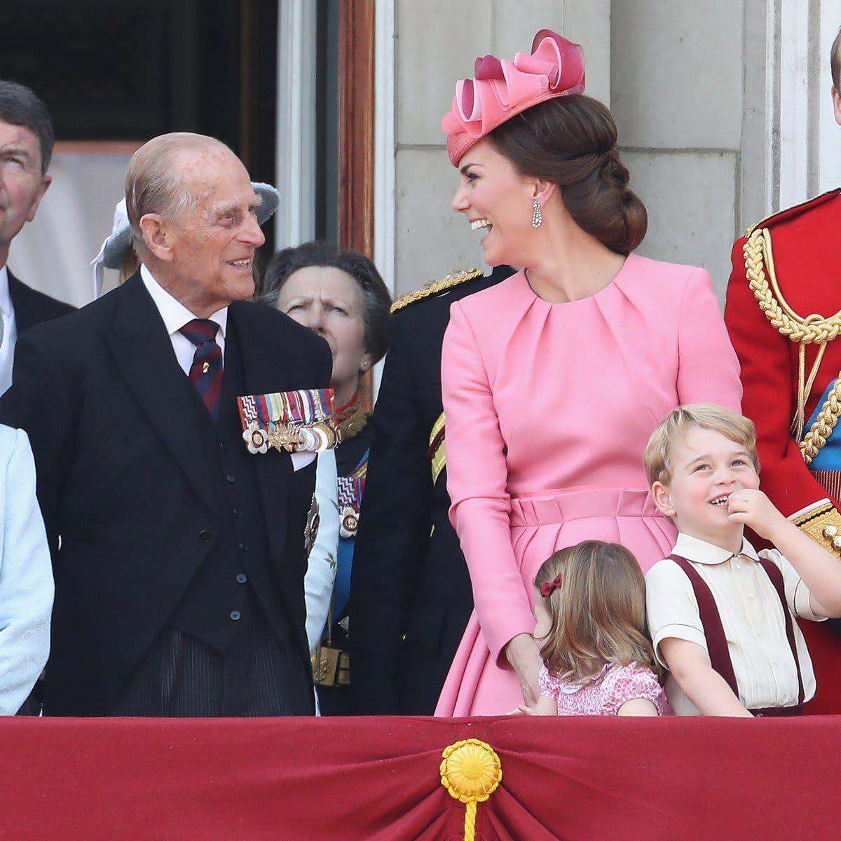 Must have been something he said! Kate Middleton laughed while chatting with her grandfather-in-law during Troop the Colour in 2017.