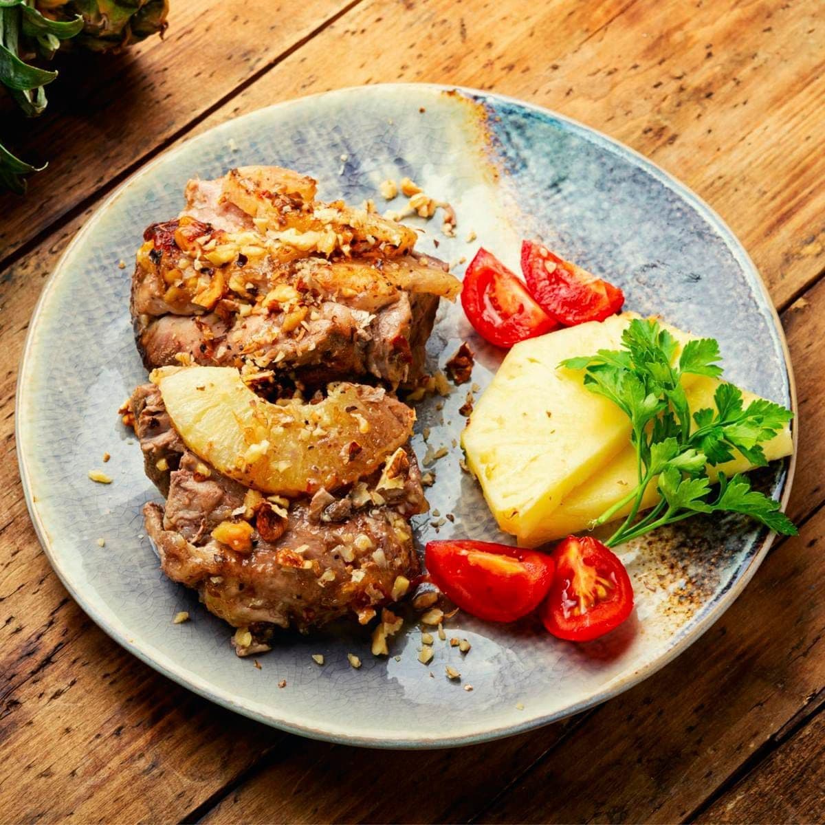 Pork meat grilled with pineapple and cheese