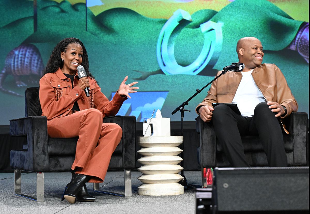 Michelle Obama, Craig Robinson & Dr. Laurie Santos" during SXSW Conference & Festivals at Austin Convention Center