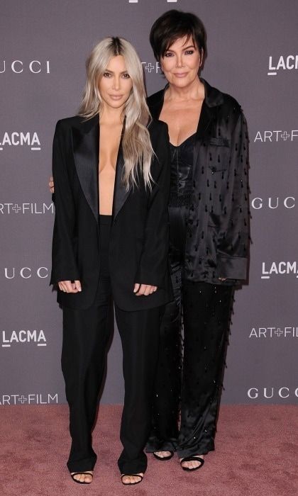 Meanwhile, Melanie's good friend Kris Jenner and her daughter Kim Kardashian went a bit more minimal for the LACMA Art + Film Gala. The <i>Keeping Up with the Kardashians</i> star showed some skin in an oversized black blazer and trousers by Tom Ford for Gucci. Her momager, who was celebrating her birthday weekend, also wore a black satin suit.
Photo: Jason LaVeris/FilmMagic