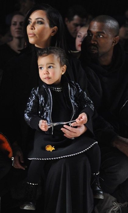 <b>February 2015</b>
<br>
Arguably, it was North that stole the show at Alexander Wang's runway during the Mercedes-Benz Fashion Week. The toddler matches her parents in an all black ensemble, but the pearl string edging on her dress is a fun addition to the tough look.
</br><br>
Photo: Getty Images