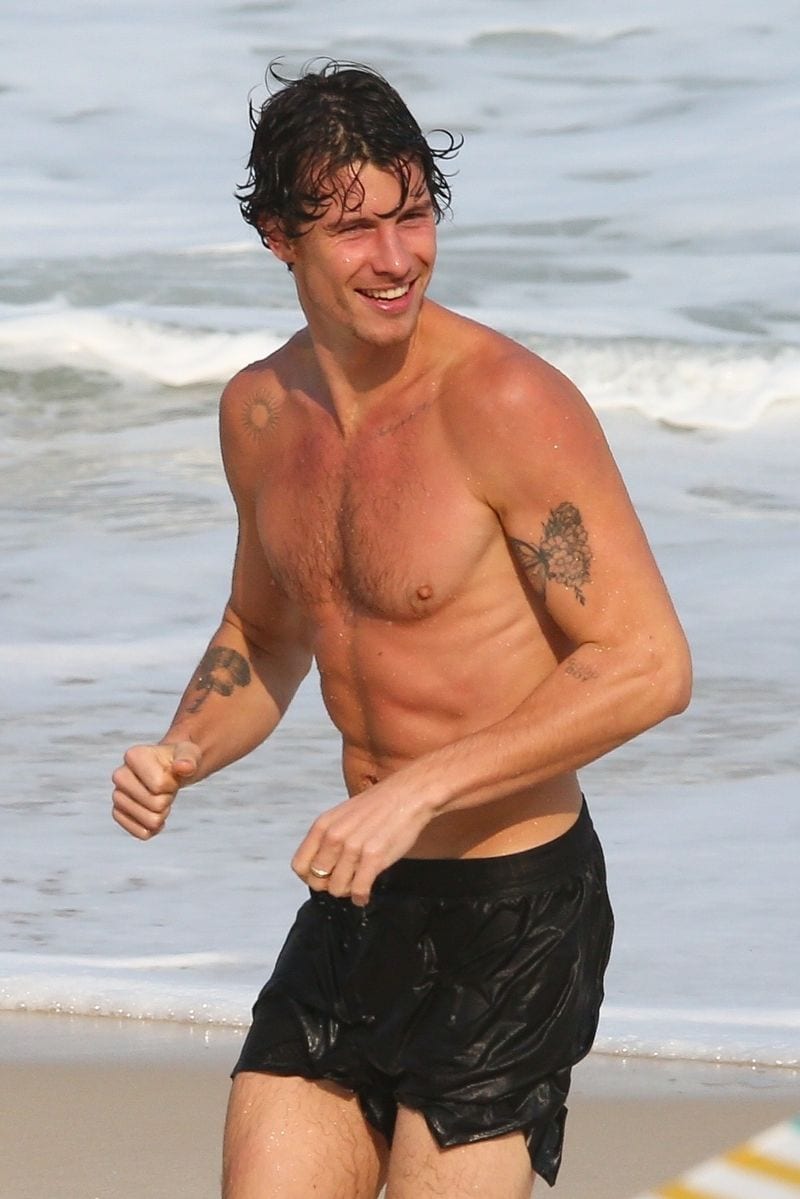 Shawn Mendes was spotted enjoying the beach in Rio de Janeiro, where he surfed and spent time with friends.