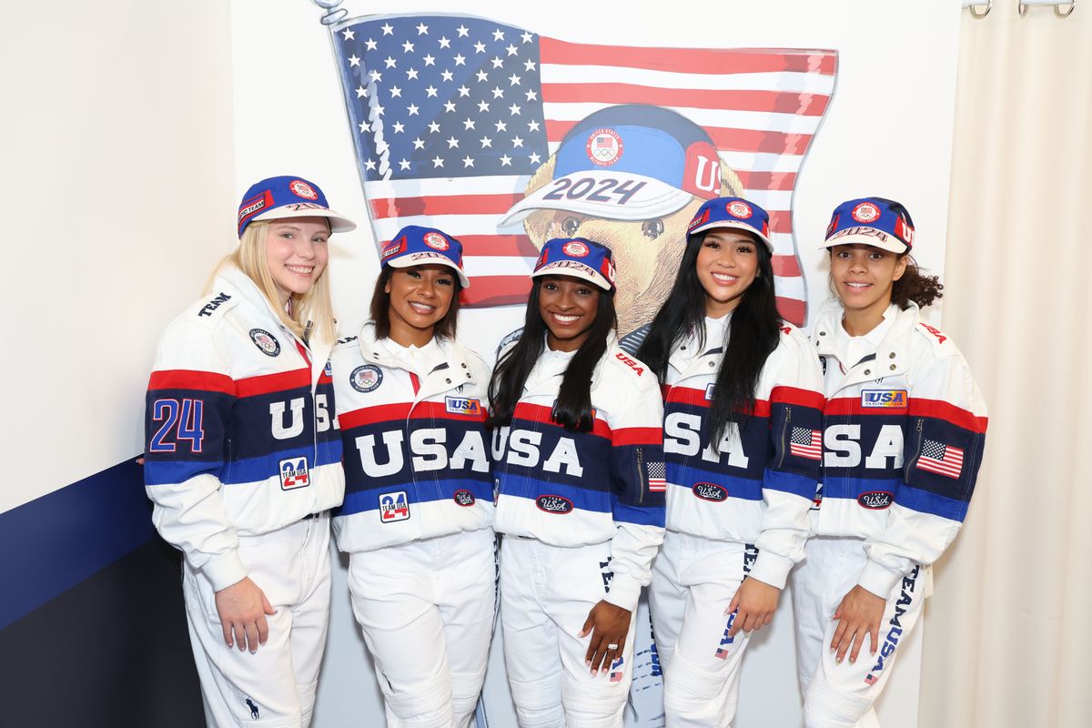 Jade Carey, Jordan Chiles, Simone Biles, Sunisa Lee, and Hezly Rivera try on clothes at the Team USA Welcome Experience Ahead of Paris 2024 on July 22, 2024, in Paris, France.  (Photo by Joe Scarnici/Getty Images for USOPC)